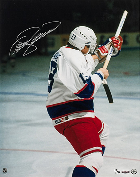 teemu-selanne-autographed-rookie-of-the-year-photo-84809.jpg