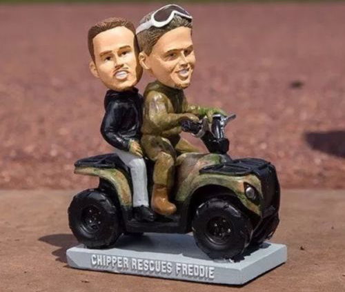 Chipper spots error on his Braves bobblehead